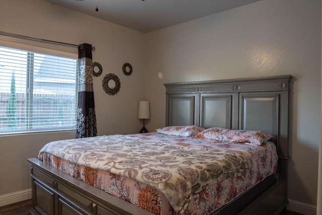 bedroom featuring dark hardwood / wood-style floors