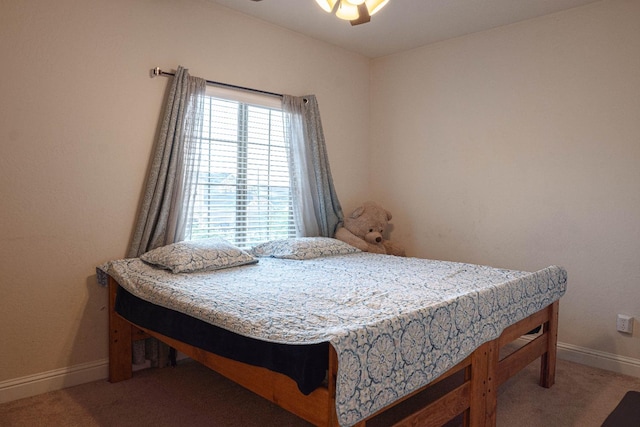 bedroom with carpet and ceiling fan