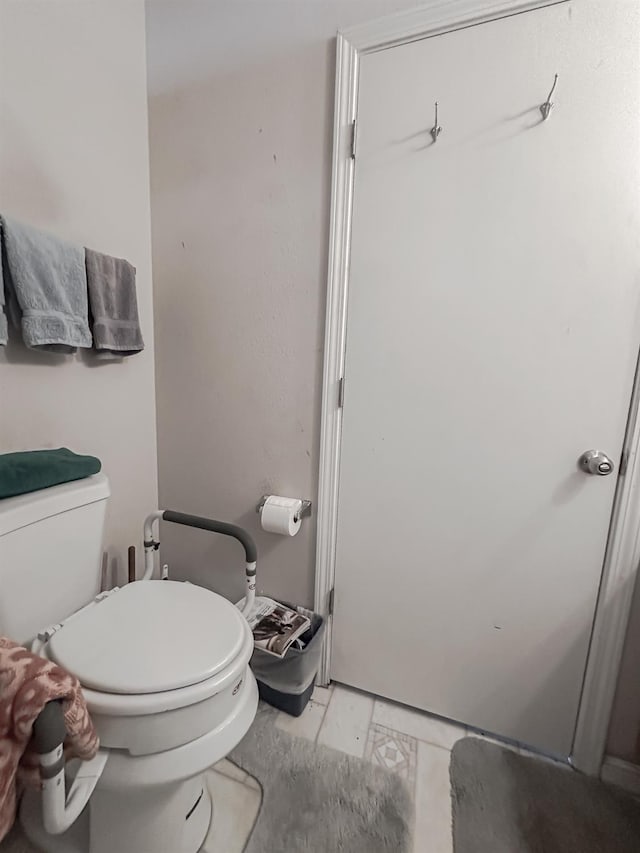 bathroom featuring toilet