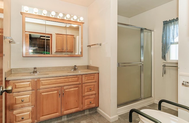 bathroom featuring vanity and walk in shower