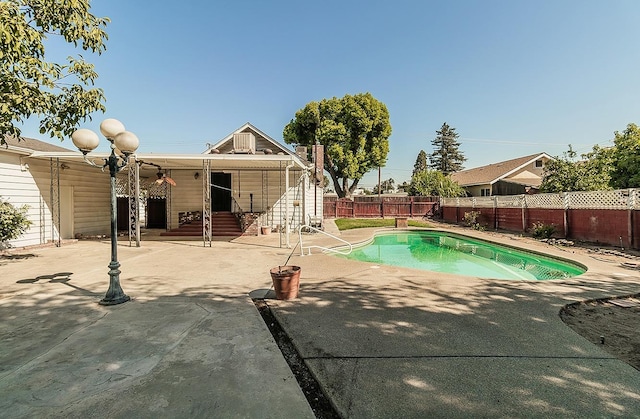 view of swimming pool featuring a patio