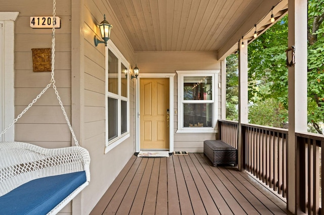 wooden terrace with covered porch