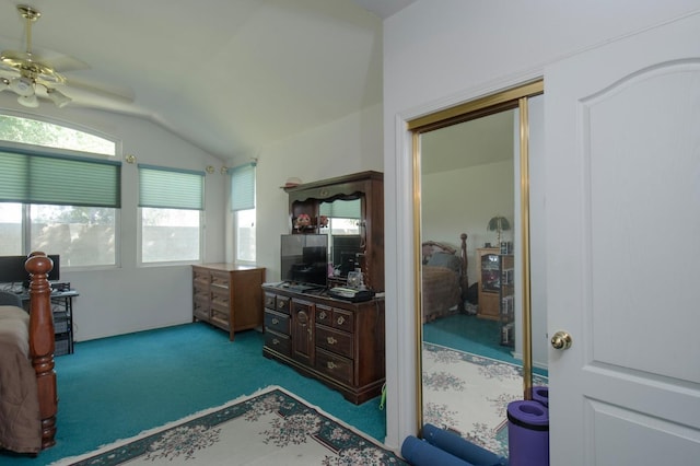 bedroom featuring multiple windows, ceiling fan, carpet floors, and vaulted ceiling