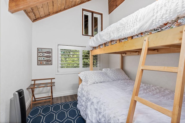 bedroom featuring vaulted ceiling, hardwood / wood-style flooring, and wooden ceiling