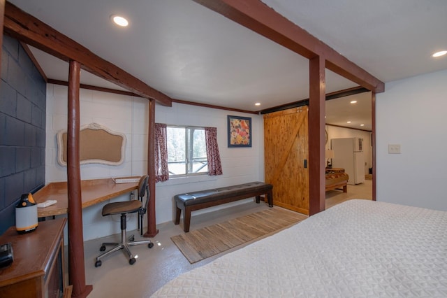 bedroom featuring a barn door, beamed ceiling, and white refrigerator