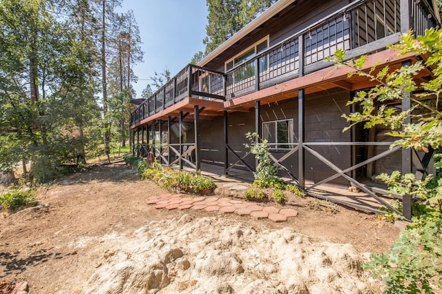 rear view of property with a deck