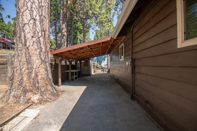 exterior space with a carport