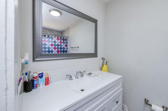 bathroom featuring vanity and walk in shower