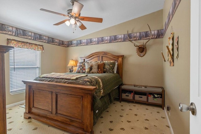 bedroom with light colored carpet, ceiling fan, and vaulted ceiling