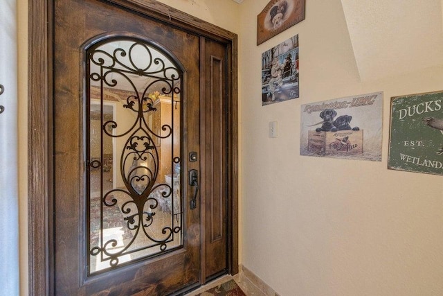 foyer entrance with vaulted ceiling