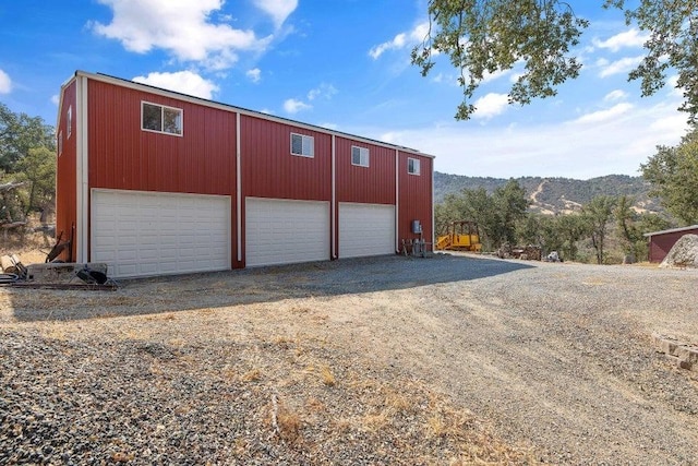 garage featuring a mountain view