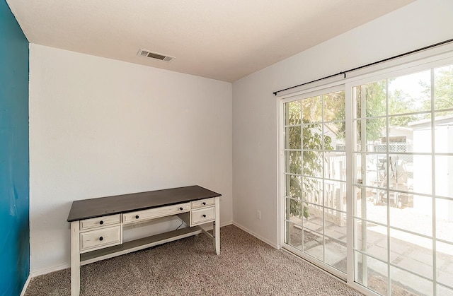 miscellaneous room featuring carpet