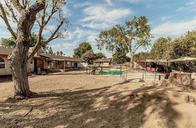 view of property's community with a pool