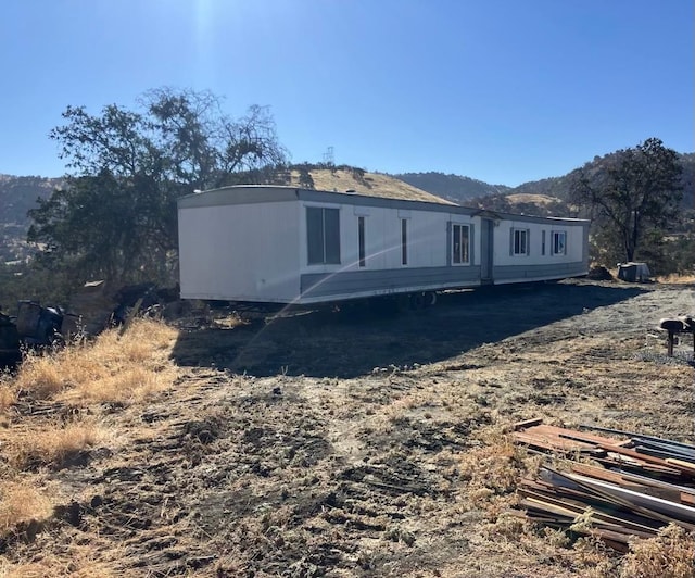 exterior space with a mountain view