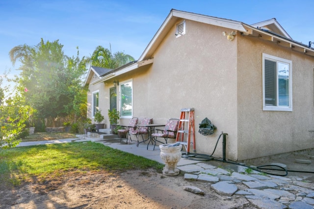 rear view of house with a patio area