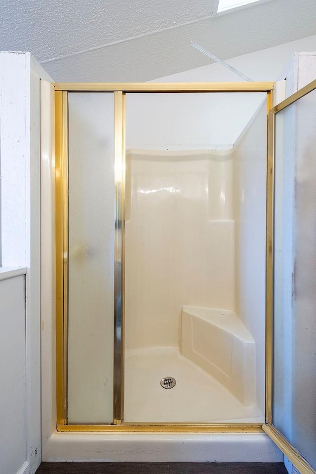 bathroom with an enclosed shower