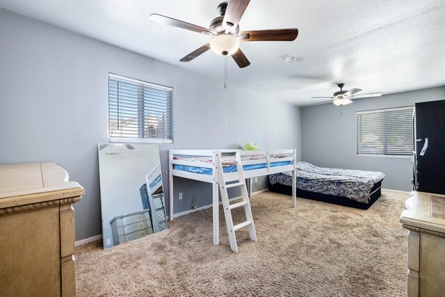 bedroom with carpet flooring and ceiling fan