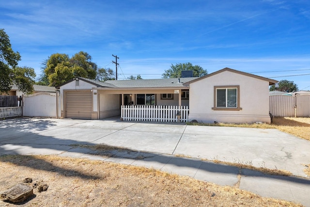 single story home featuring a garage