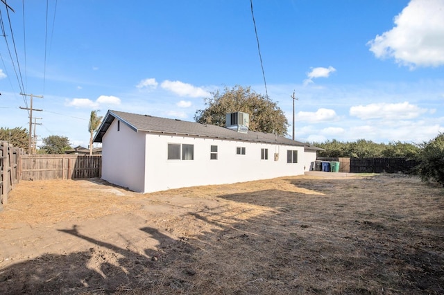 back of property with cooling unit