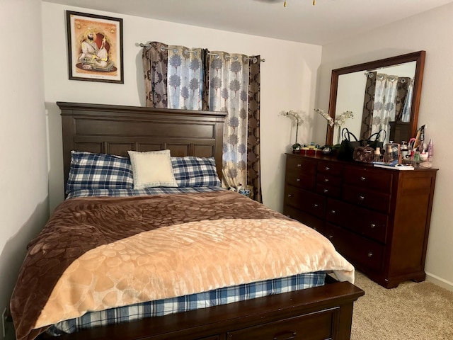 bedroom with light carpet