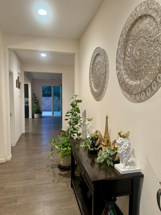 corridor featuring dark hardwood / wood-style flooring