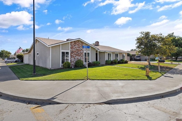 single story home with a front yard