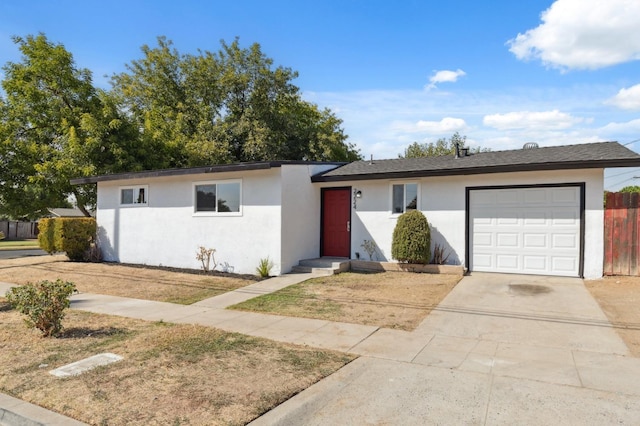 ranch-style home with a garage