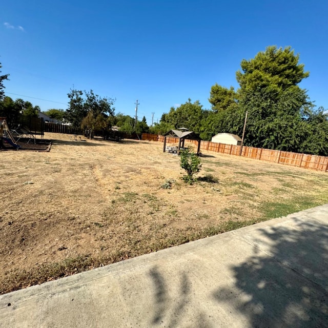 view of yard with fence