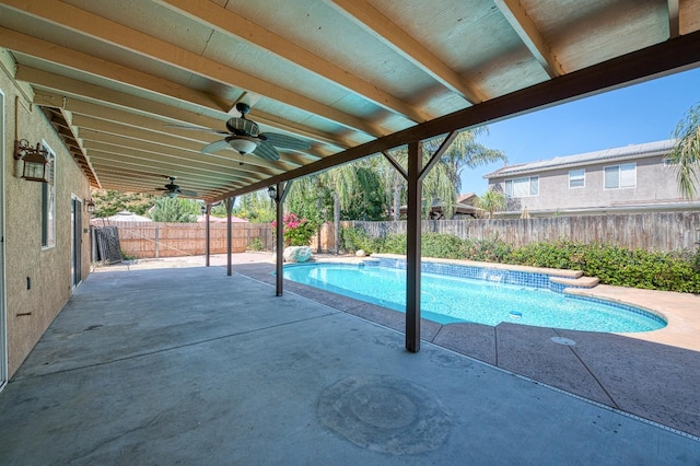 view of pool with a patio area and ceiling fan