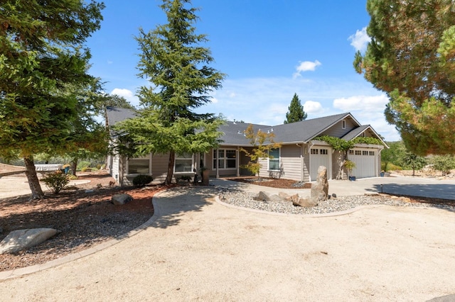 view of front of property with a garage