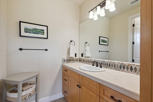 bathroom featuring vanity