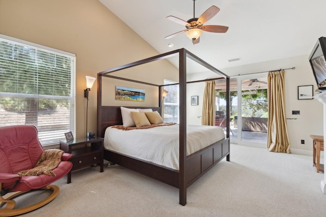 carpeted bedroom with ceiling fan, access to outside, multiple windows, and high vaulted ceiling