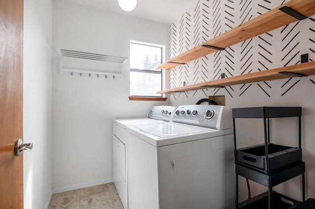 washroom featuring washer and dryer