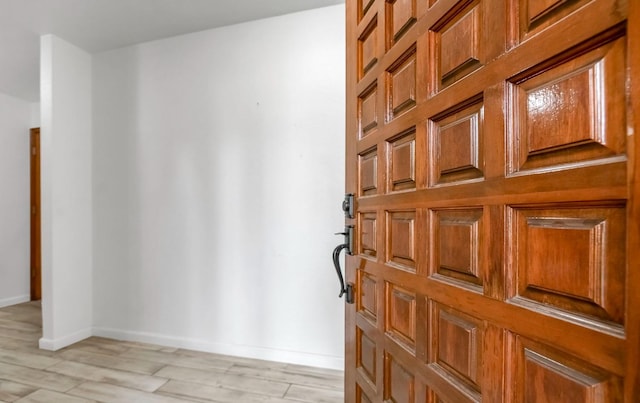 entrance foyer with light hardwood / wood-style flooring