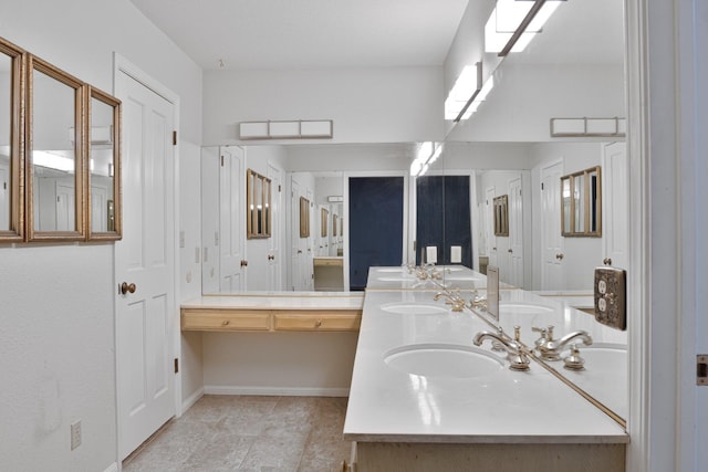 bathroom featuring vanity and tile patterned floors