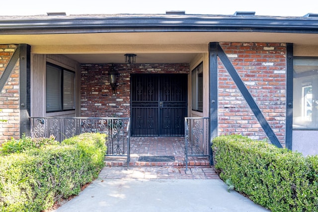 entrance to property with covered porch