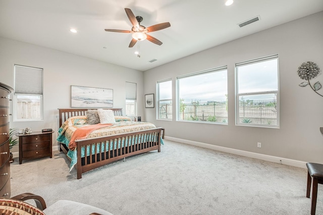 carpeted bedroom featuring ceiling fan