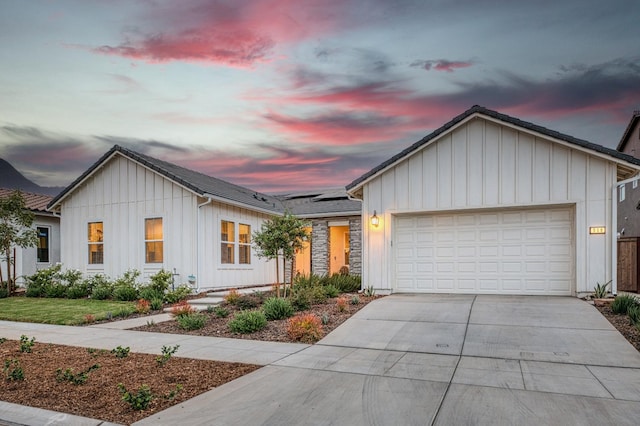 view of front of home with a garage