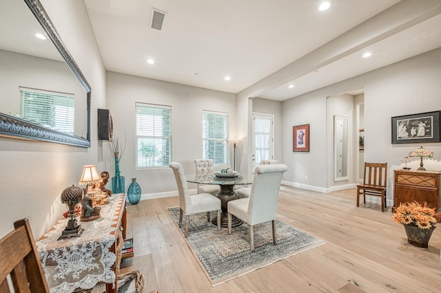 dining area with light hardwood / wood-style flooring