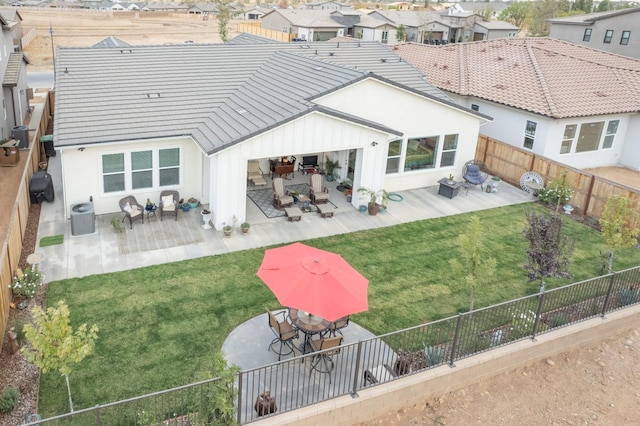 exterior space with a yard and a patio area