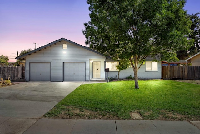 ranch-style house featuring a lawn