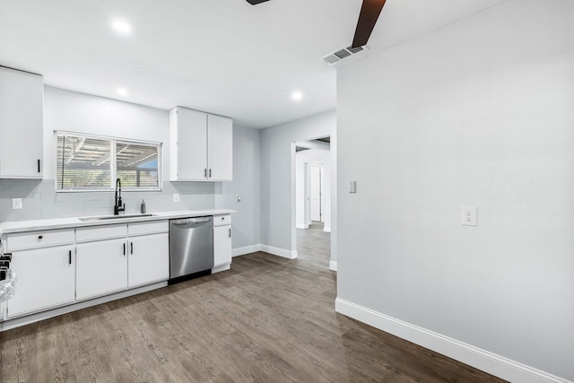 kitchen with white cabinets, dishwasher, light wood-type flooring, and sink