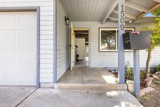 property entrance featuring a garage