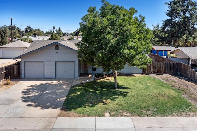 view of front facade featuring a front lawn and a garage