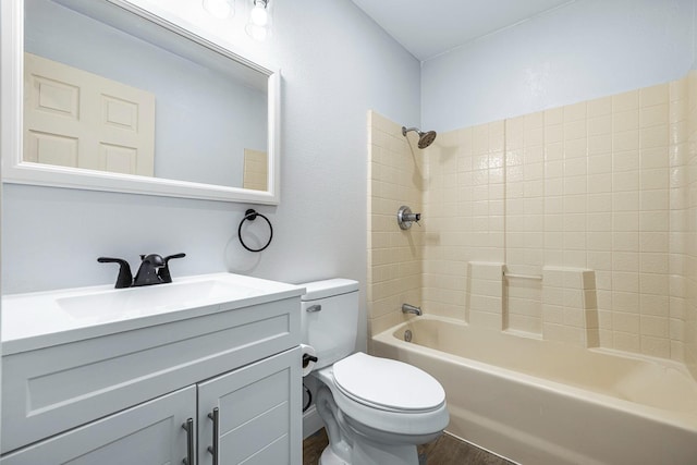 full bathroom with bathtub / shower combination, hardwood / wood-style floors, vanity, and toilet