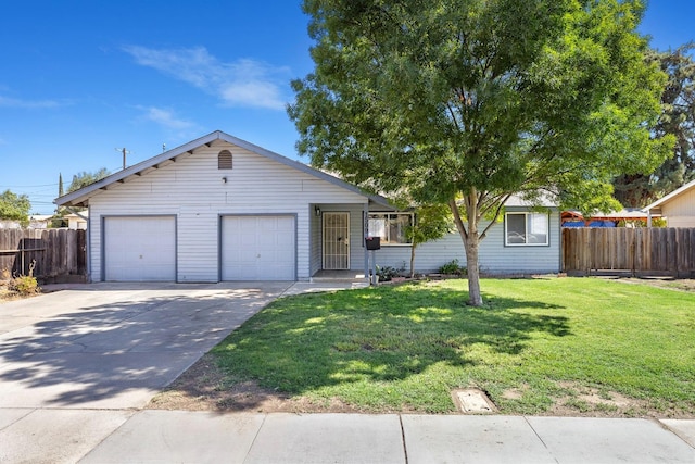 single story home with a garage and a front lawn