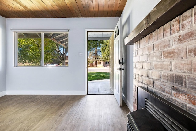 entryway featuring wooden ceiling and hardwood / wood-style floors