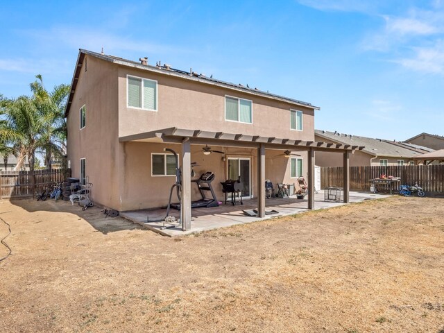 rear view of property with a patio