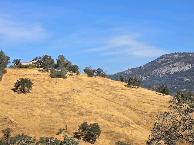 view of mountain feature with a rural view