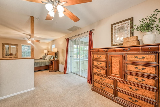 bedroom featuring ceiling fan, light carpet, and access to exterior